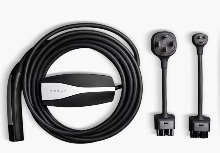 Tesla Gen 2 charger Universal Mobile Connector UMC charging with 220-Volt and 110-Volt adapters.