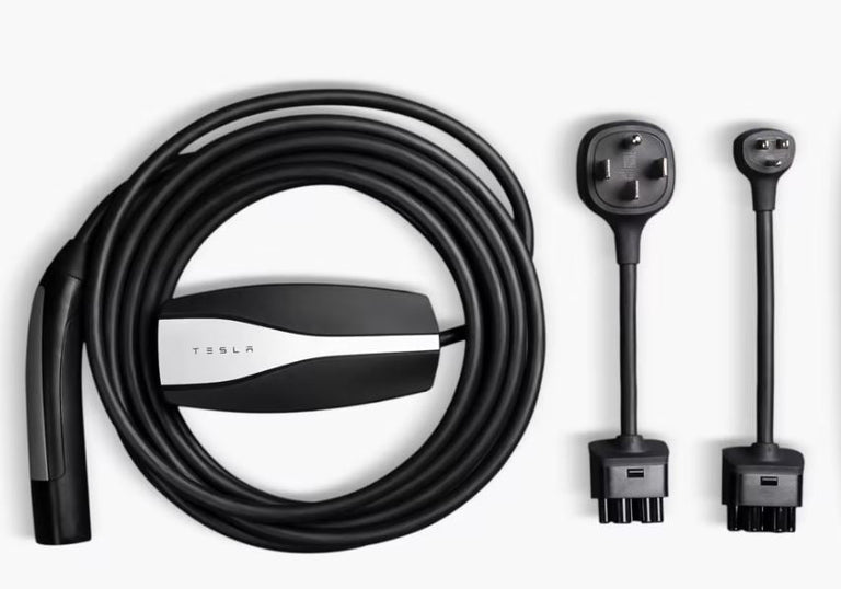 Tesla Gen 2 charger Universal Mobile Connector UMC charging with 220-Volt and 110-Volt adapters.